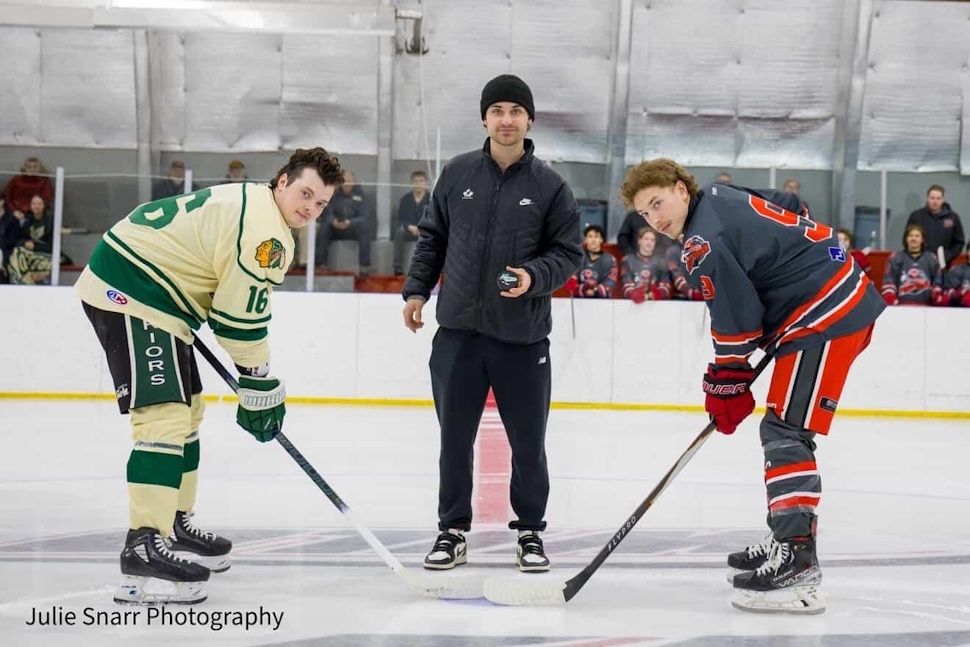 Mateychuk participating in ceremonial puck drop